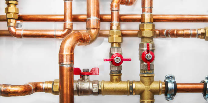 Hot water system with copper pipework